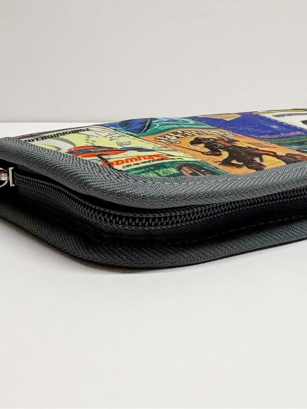 Harveys Black Multicolor Patchwork Disneyland Wristlet